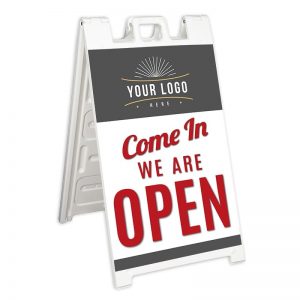 White Signicade with We Are Open Sign