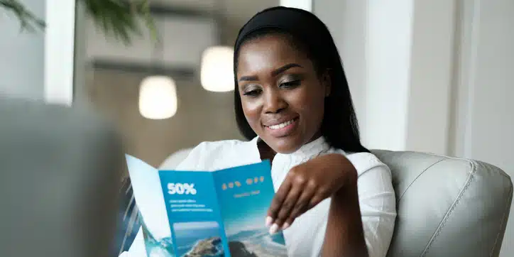 woman reading brochure